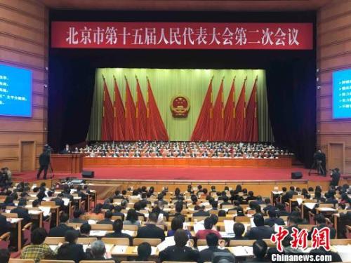 北京市十五屆人大二次會議14日開幕。北京市長陳吉寧向大會作政府工作報告?！∫?攝